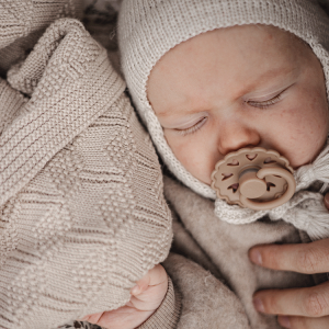 A frigg pacifier for baby